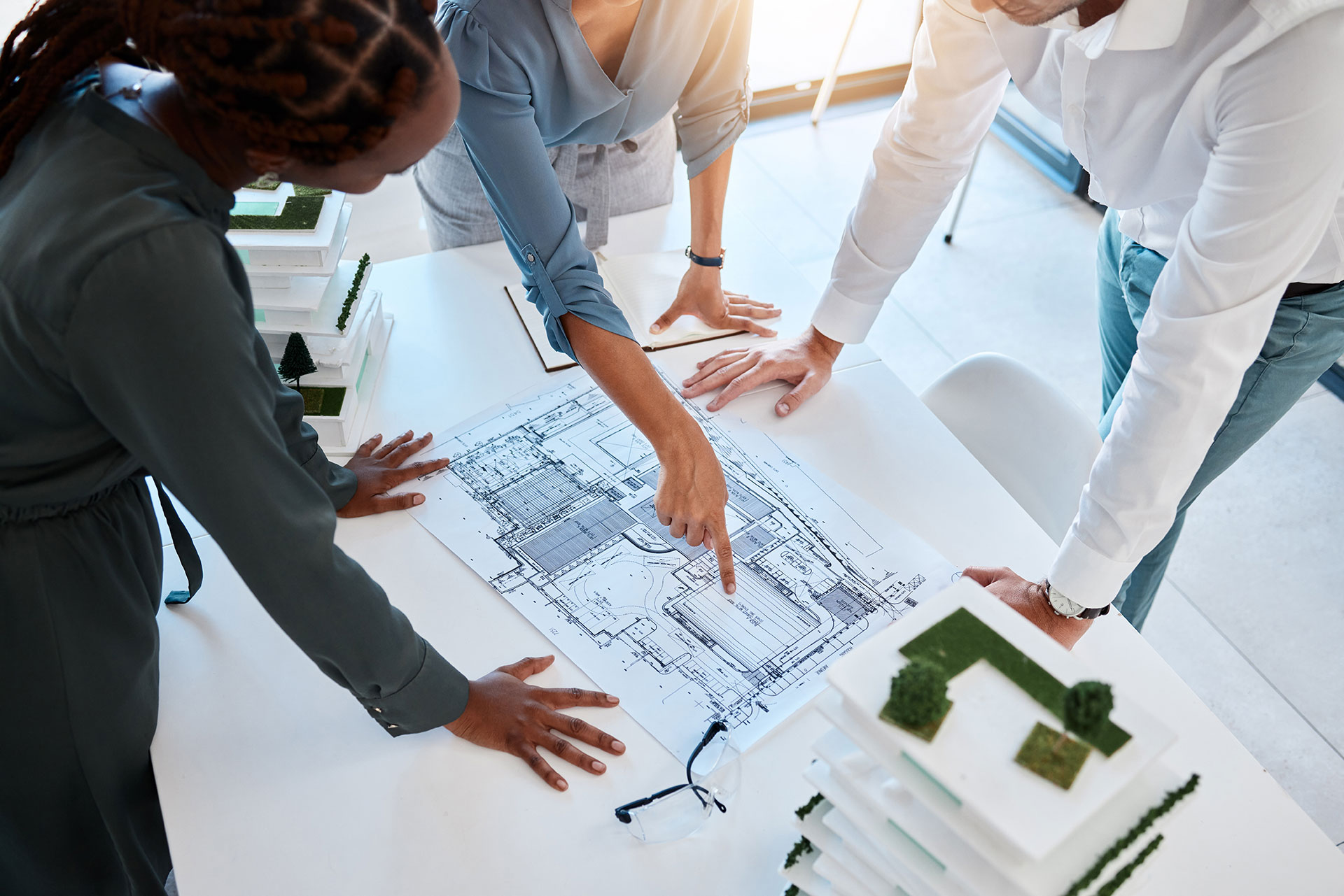 Architect team and planning building blueprint